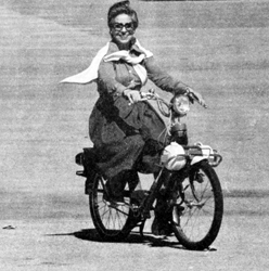 Woman on a solex 4600