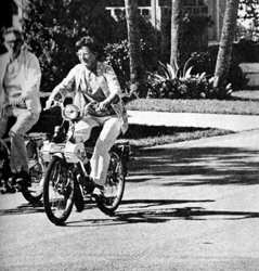 Woman on a solex 4600