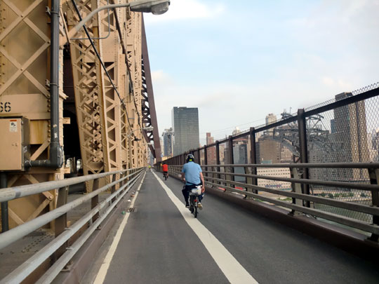 Crossing the queensborough bridge from long island to manhattan island