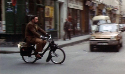 Phlippe Noiret sur un Solex